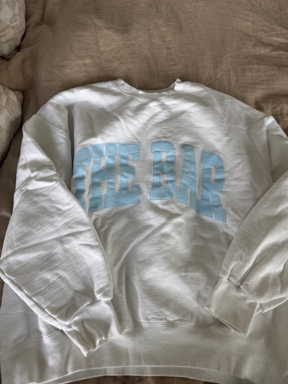 The Bar White Crewneck Sweatshirt with Light Blue Chest Logo